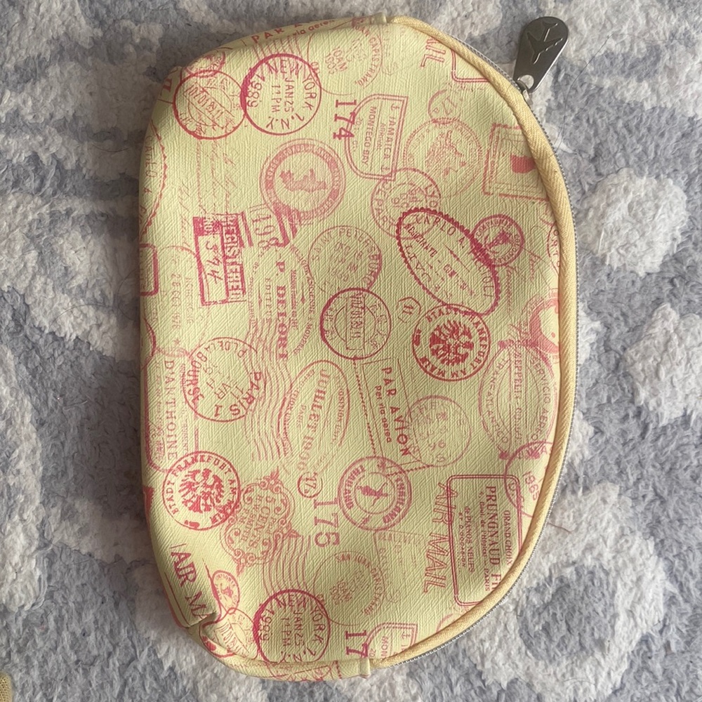 This lightweight, Ipsy pouch is perfect for makeup or jewelry for traveling!